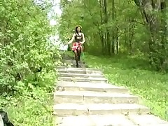 Girlie lies down onto a pedestrian path increased by pees Part 1