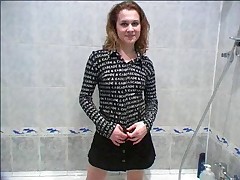Teeny with a trimmed snatch pees in the shower Attaching 1
