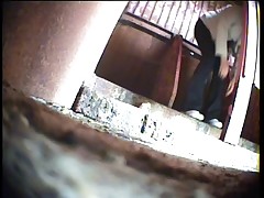 Curvaceous women filmed urinating in a public restroom Part 1