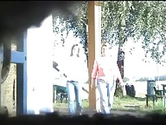Observer captures both a senior and a younger lady in a restroom setting Part 1