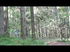 Slim swarthy blonde caught urinating under a tree Part 1