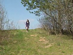 See a nasty brunette ho pissing in the city park Part 1