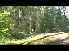 Cute blonde babe wetting the soil on a forest blade Fastening 1