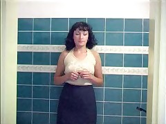 Chubby brunette peeing in bath Part 1