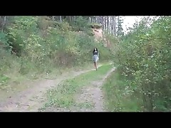 Racy teenage shortie piddles in the forest Attaching 1